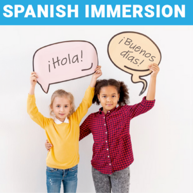  Spanish Immersion with students holding bubbles Hola! & Buenos dias!